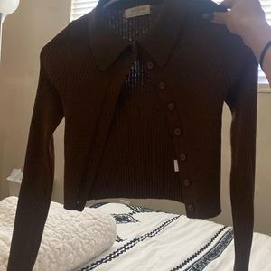button up long sleeve with a little crop at the bottom depending on your height